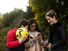 Zahra and her two children spending time at the local park in their new hometown, High Wycombe, Buckinghamshire.