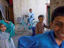 Children in Jalalabad, the provincial capital of Nangarhar, Afghanistan. The International Rescue Committee has provided cash grants to families in this region as parents struggle to find work.