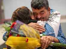 Collage of refugees smiling and embracing after reuniting