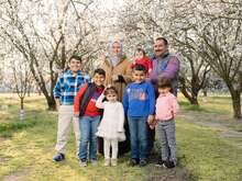 A family posing for a family portrait.