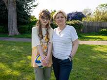 Margarita at her home with her daughter 