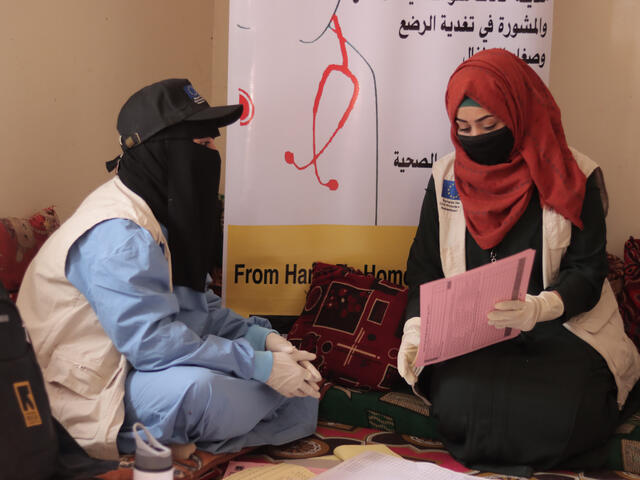 Dr. Bushra with an IRC healthworker during one of their field visits