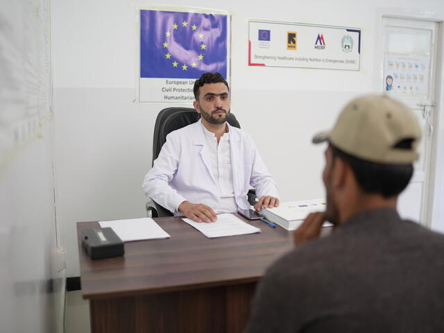 Khalid talks to the IRC's psychologist during a session