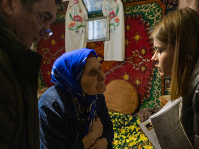 Patient Lidia talks to a member of the IRC medical unit, community mobilizer Darina.