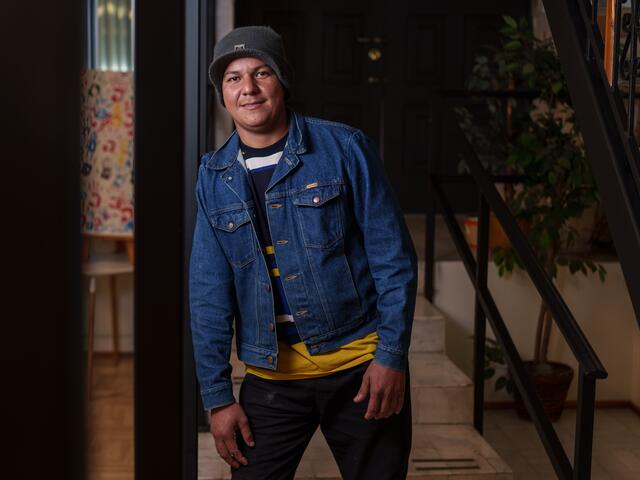 Iván, 28, from Venezuela, poses for a portrait after an activity part of a men’s group at the IRC office in Ciudad Juárez.