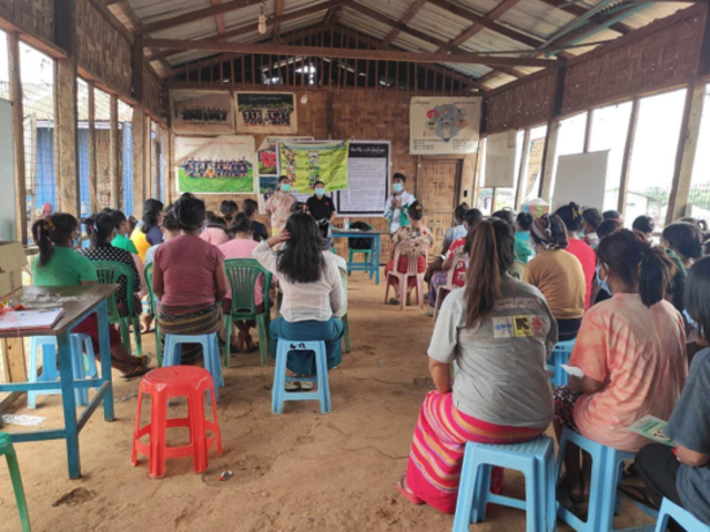 The KMSS staff give a health education session to women living in a camp in Northern Shan State.
