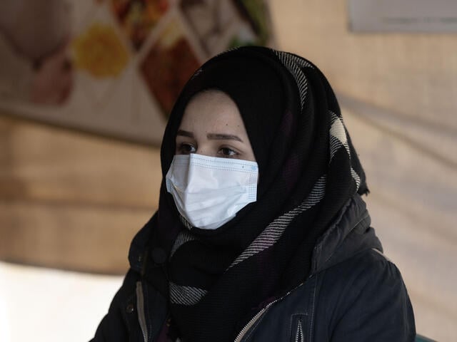 Samira, 28, knew there was an EU-funded health facility near her home that provided free services. When her son fell ill with cholera, IRC health workers provided treatment and follow-up visits to help him recover. Photo: Khalil Ashawi / IRC