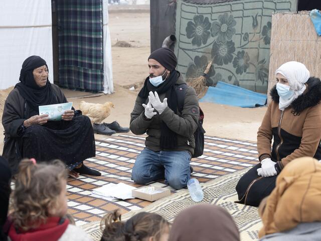 An awareness campaign is delivered by IRC employees to the camp residents in northeast Syria, about the prevention of cholera and how to deal with it.