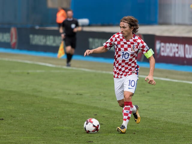 Luka Modrić playing soccer