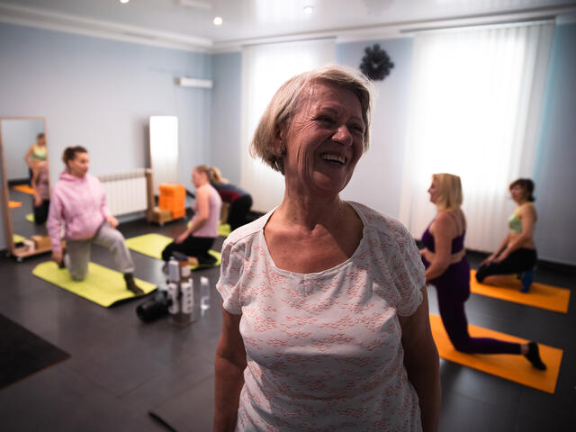Iryna takes a yoga class at the EU-funded women's centre.