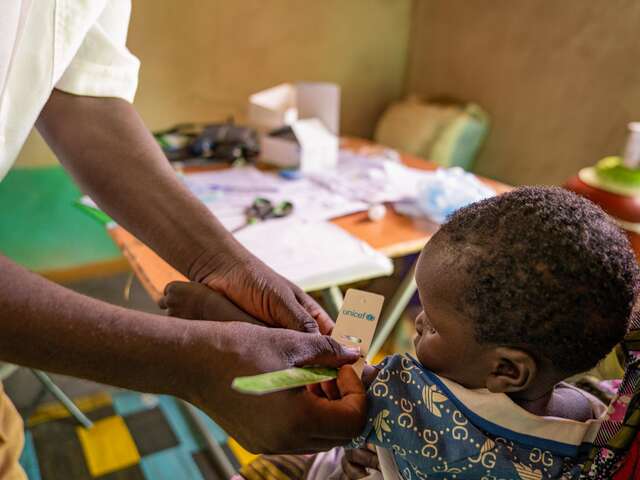Child getting assessed for malnutrition