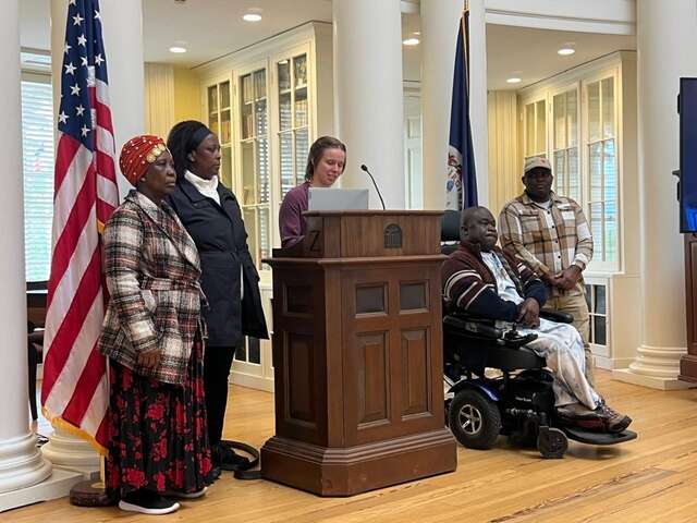 5 people at podium