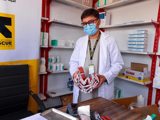 The pharmacist at the IRC’s EU-funded clinic with ready-to-use therapeutic food (RUTF) packs—highly effective, life-saving nutritional supplements given to children suffering malnutrition