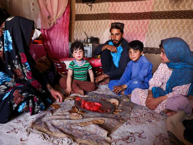Afsana and her family have lunch at home, consisting of a few pieces of bread and watermelon. The family cannot afford much food, and frequently have to make do with a meager amount.