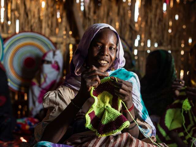 35-year old Achta knitting at the IRC’s Women Center at Fourkouloum camp.  Photo: Jacob Zocherman for the IRC