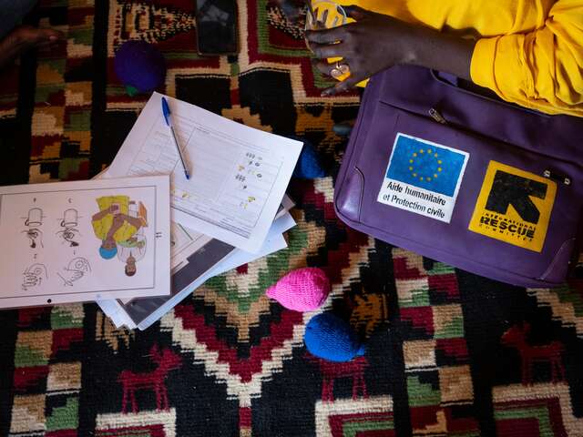 Educational materials IRC officer Madjilem Sabine uses to build the capacity of volunteer facilitators like Bintou.