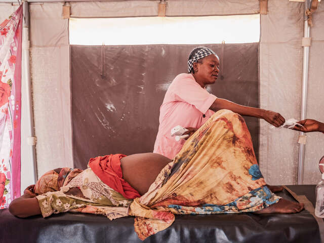 IRC mid wife Njdepa Dingatoloum (32) during antenatal session with Mariam* at Materity Ward in IRC clinic in Aboutengue refugee camp.