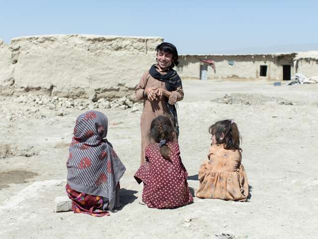 Darweza plays with children from his village. After finding inner strength and acceptance, he feels much more certain about his place in his community. 