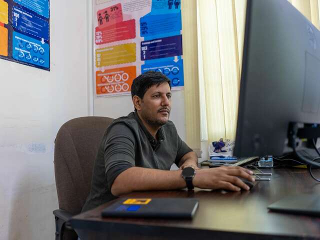 Dr Ahmed at his desk 