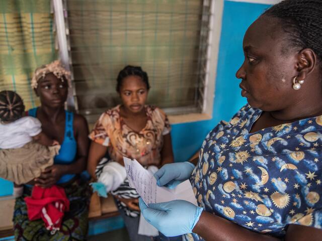 Gborlu receives support for her baby from trained health workers free of charge at Konia Health Centre.