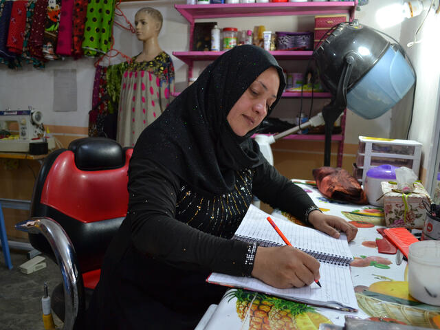 Alia works at her desk