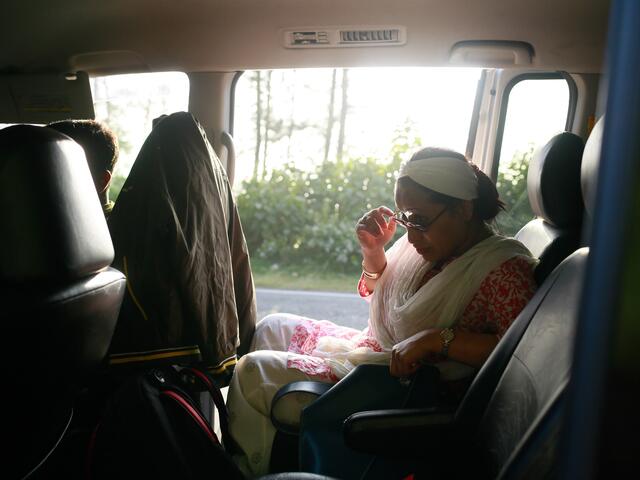 Razia Sultana in a car on her way to Cox's Bazar Bangladesh camp where Rohingya people are living 