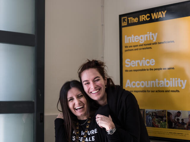 Lena Headey and Kiki hug in a mental health centre in Lesbos