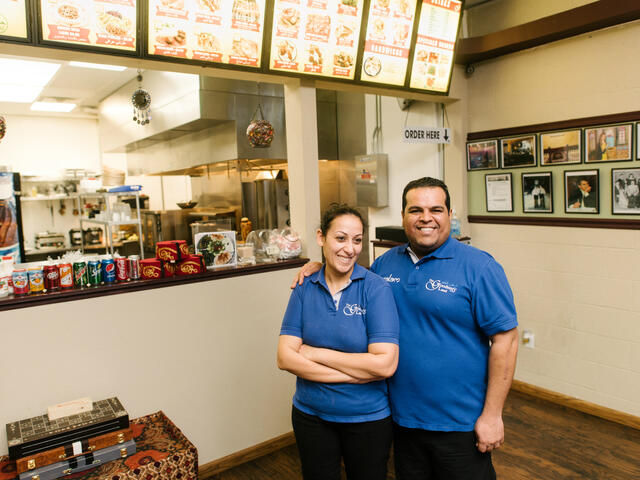 Salam Bunyan with his wife at their Boise retaurant