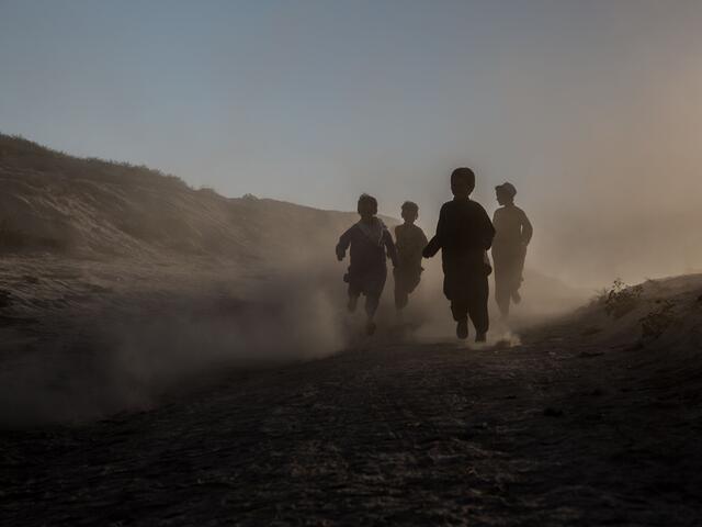 Children running through camp for drought displaced people right outside Qala-e-Naw, Badghis province in Afghanistan.