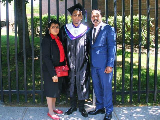 Sarujen and his parents, Shanthini and Sivakumar, at his high school graduation.