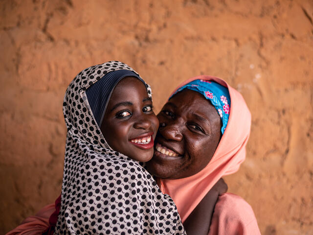 Fatima hugging her mother Habiba.