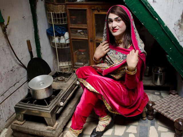 Namkeen sitting beside a stove ready to prepare tea