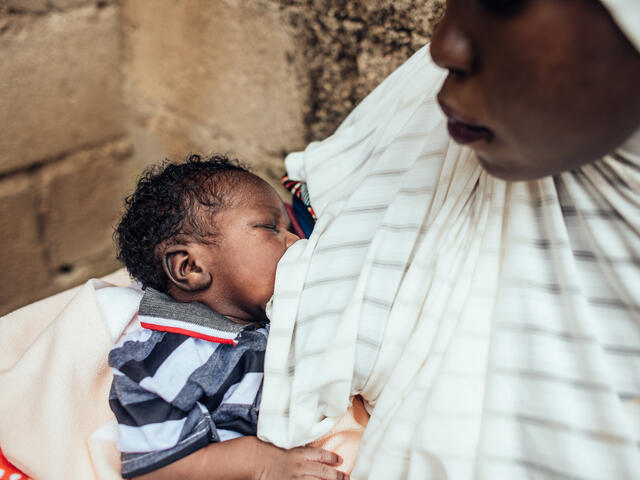 20-year-old Hussiena Ibrahim breastfeeds her baby, Bello Ibrahim who is just 7 days old. 