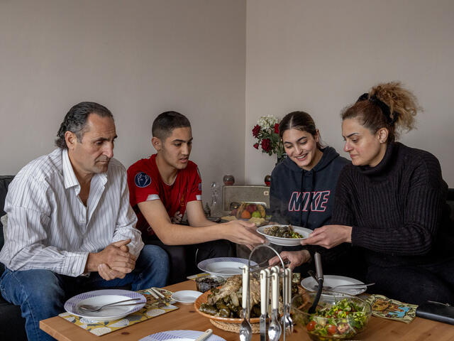 Chadia and her family having dinner.