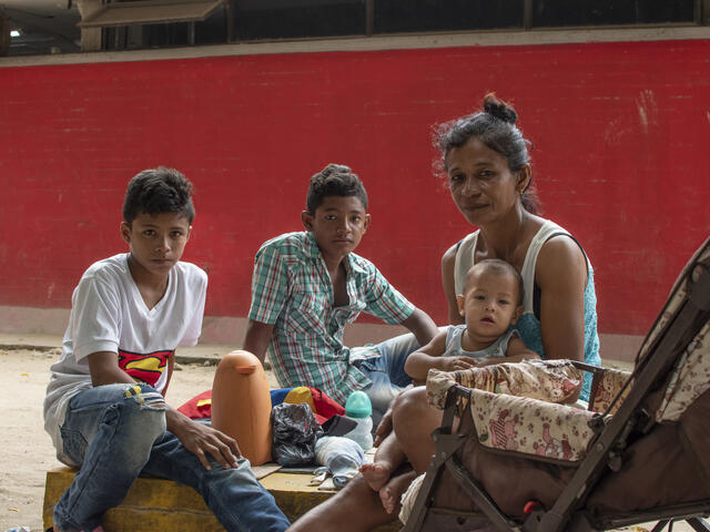 A Venezuelan mother and her three children living on the street in Bogota, Colombia