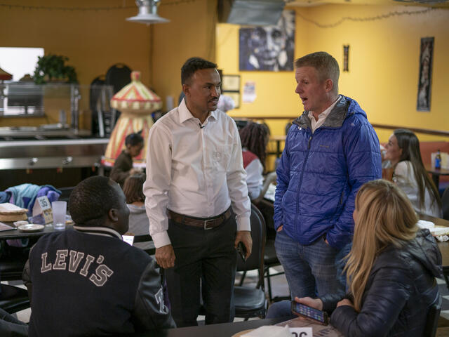 Tecle, an International Rescue Committee staff member with Idaho House of Representatives minority leader Matt Erpelding