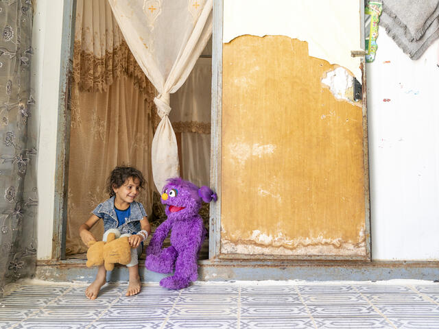 "Ahlan Simsim" new Muppet Basma with a child in Jordan