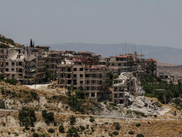 Destroyed buildings in Ariha, a city in Idlib province