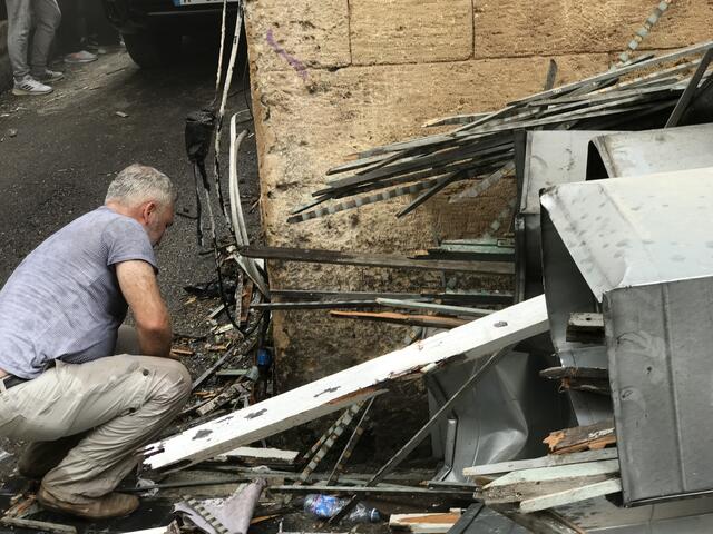 A man repairs water pipes after the Aug. 4 2020 explosion in Beirut, Lebanon