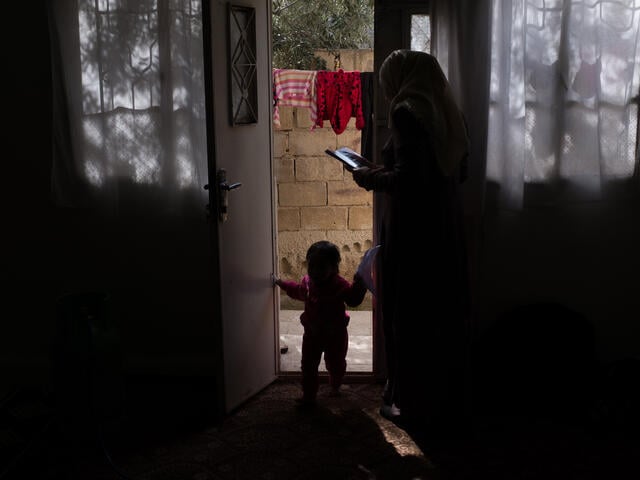 Syrian refugee woman at her home in Jordan