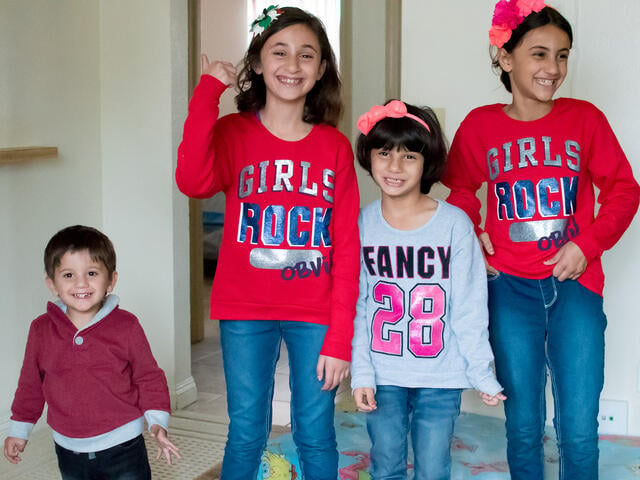 Two-year-old Khaled along with his older sisters Rouaa, Rayan and Raghad at their home in San Diego. 