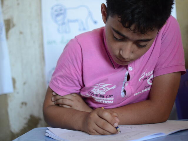 13-year-old Mahmoud attends an IRC supportive class in Lebanon
