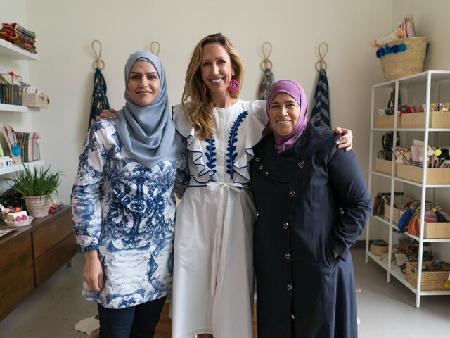 Refugee artisans Bothina and Huda with with founder Paula Minnis at Gaia Empowered Women in Dallas, Texas