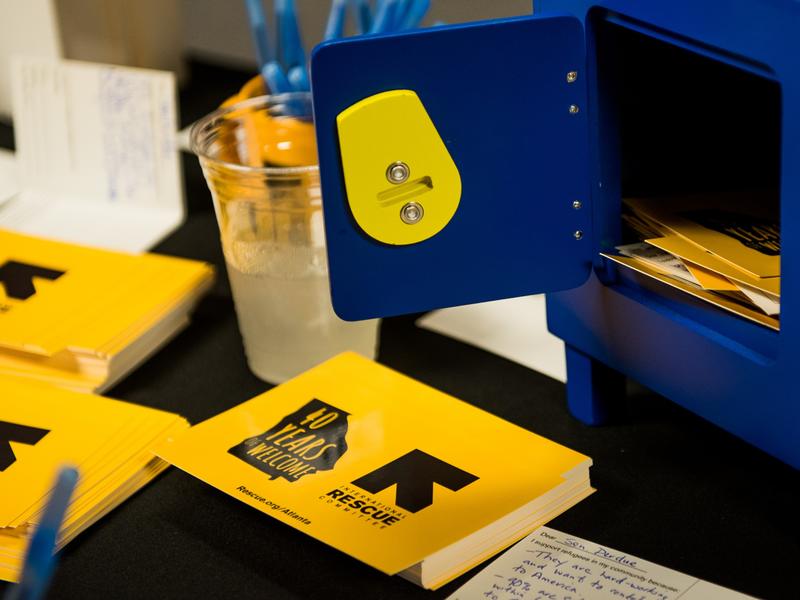 Guests showed their continued support for refugees by writing postcards to Georgia’s members of Congress at our Advocacy station. Guests showed their continued support for refugees by writing postcards to Georgia’s members of Congress at our Advocacy station.