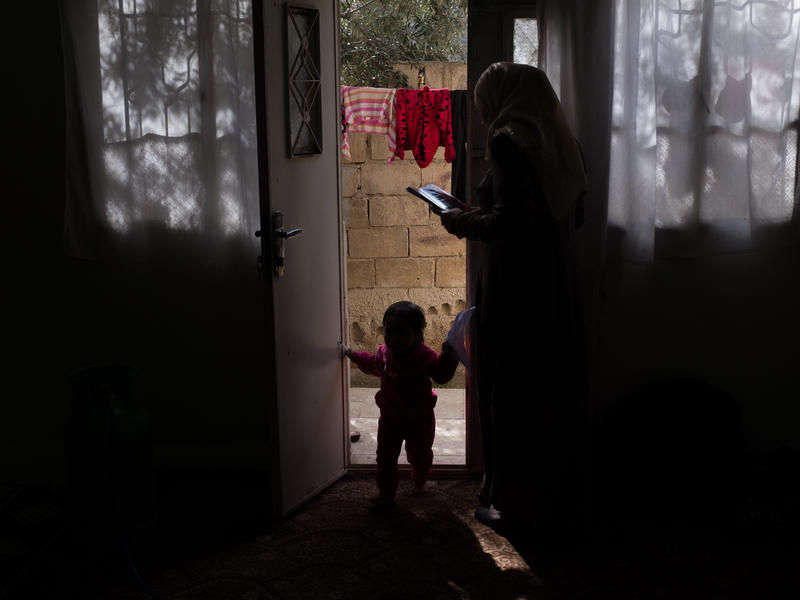Syrian refugee woman in Jordan Syrian refugee woman at her home in Jordan