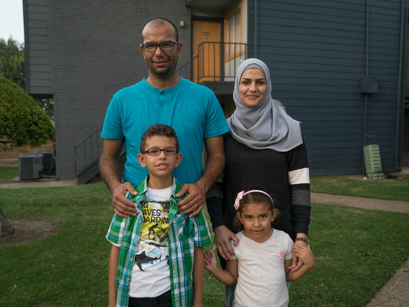 Bothina Matar, her husband and two children outside their apartment in Dallas
