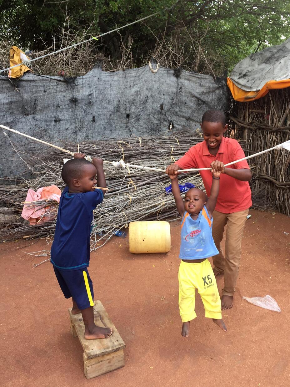 childre playing with a rope