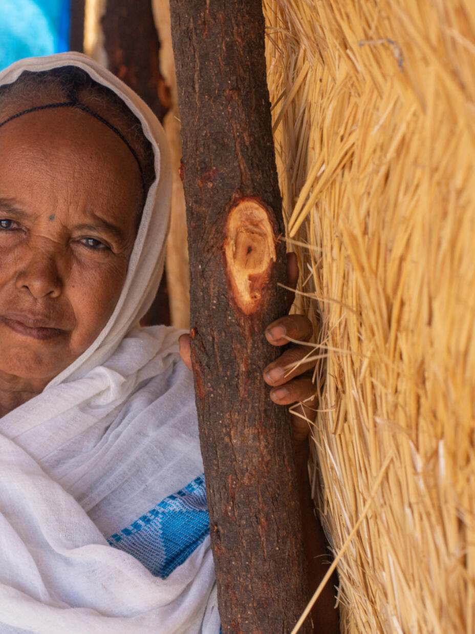 Portrait of Berhan in her home in Gedaref camp