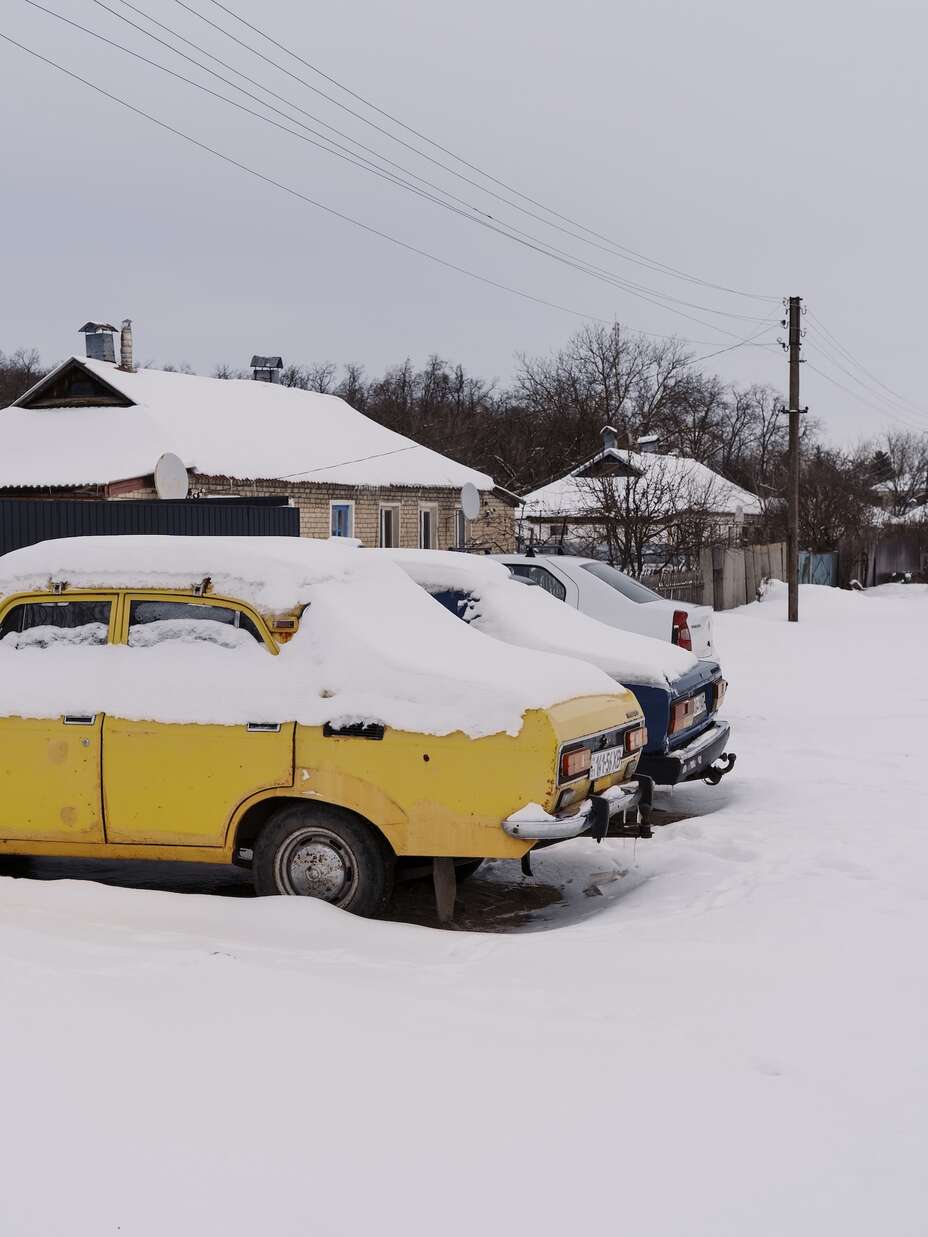 Snow blankets a quiet village in Ukraine’s Sumy region, where a recent drone strike damaged nearby homes.