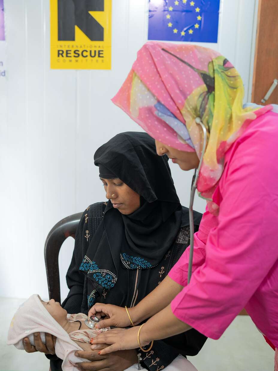 Jahanara does a health check-up on Samira’s newborn son.